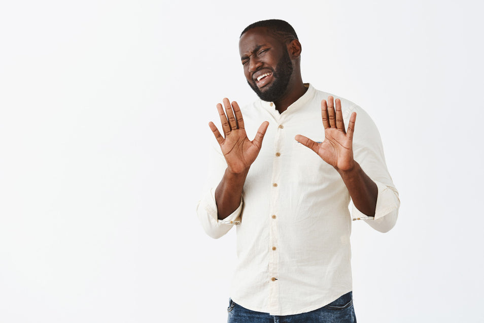 man doing a no post to things you should avoid if you want to grow your beard